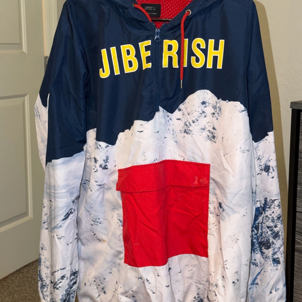 Jiberish - Navy and White Jacket with Red Mountain Patch.